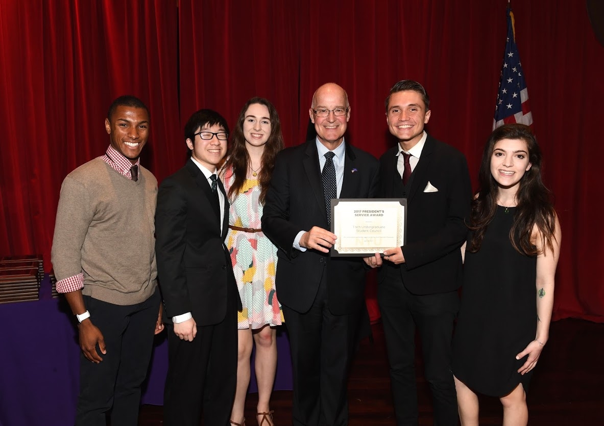 Tisch Undergraduate Student Council receives their award from President Andy Hamilton. Performance Studies B.A. students Jeremy Swanton and Rachel Greenblatt (far right) were in attendance.